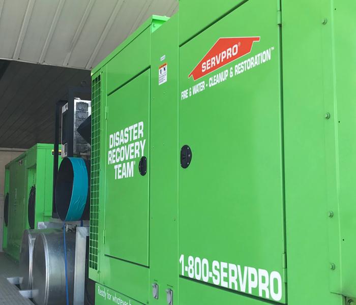 The side of a heavy equipment trailer SERVPRO uses to clean water and mold damage.